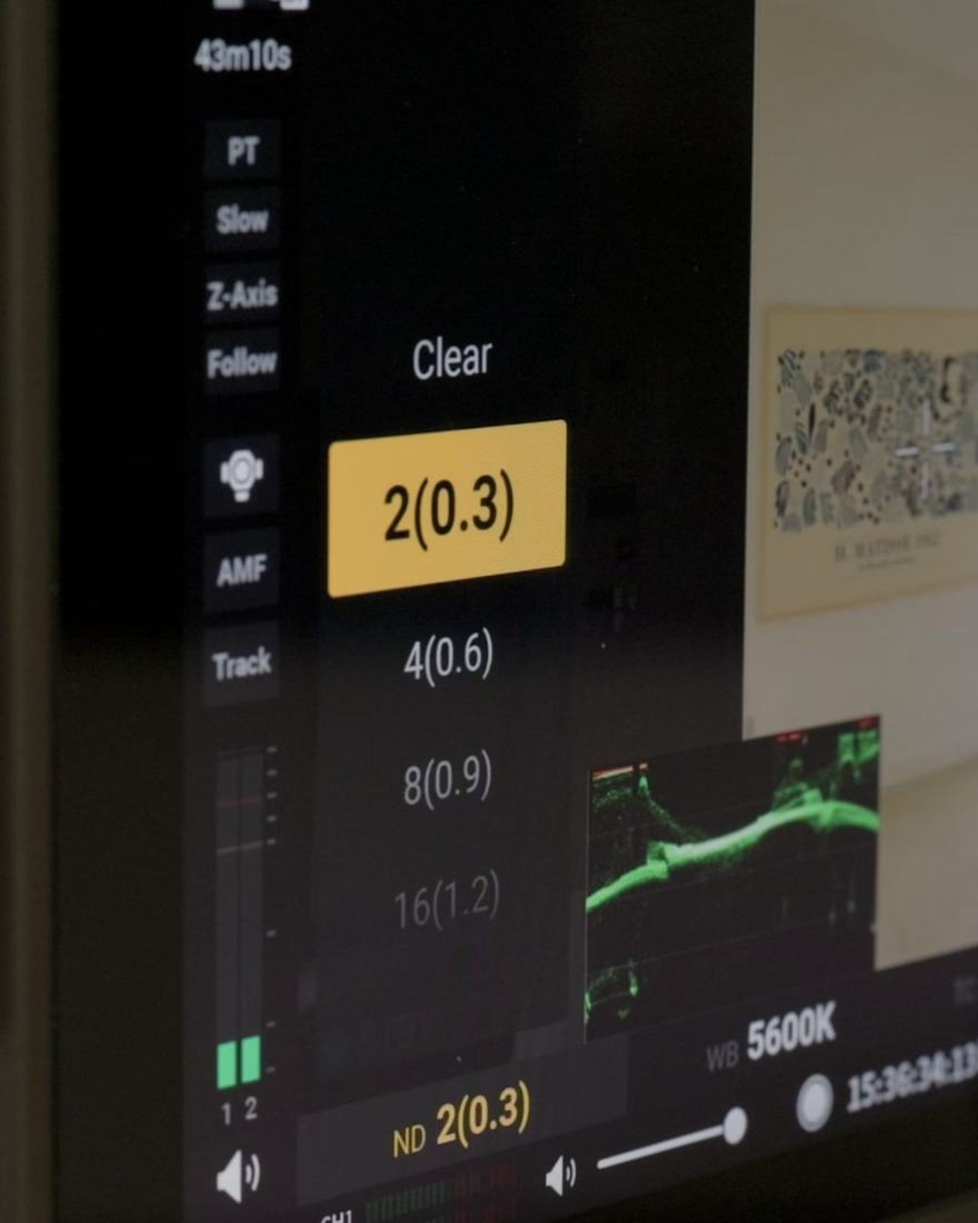 Dialling in ND while watching the waveform, to keep exposure where the look needs it.